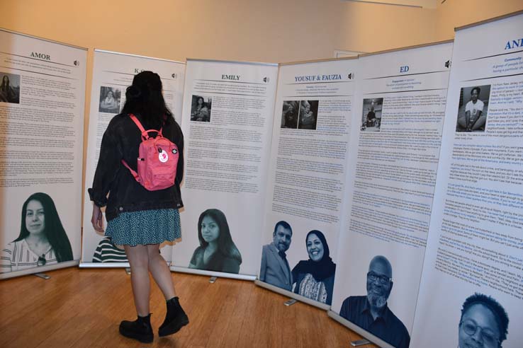 A student browsing the gallery at the event.