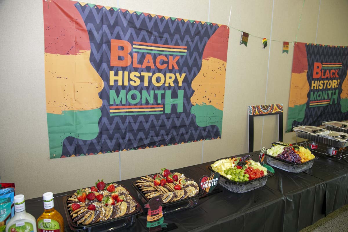 People enjoying the Black History Month closing ceremony