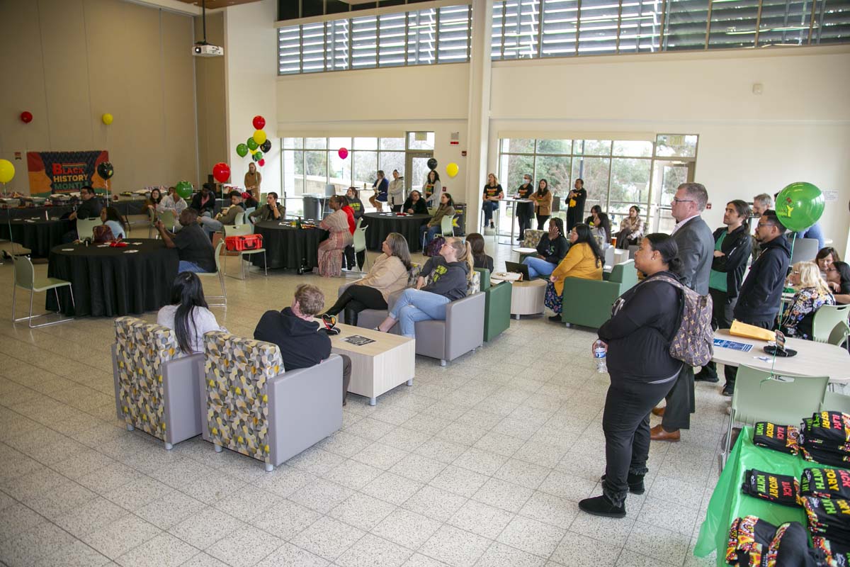 People enjoying the Black History Month closing ceremony