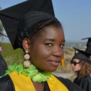  Photo of Sharifa Kato in commencement regalia