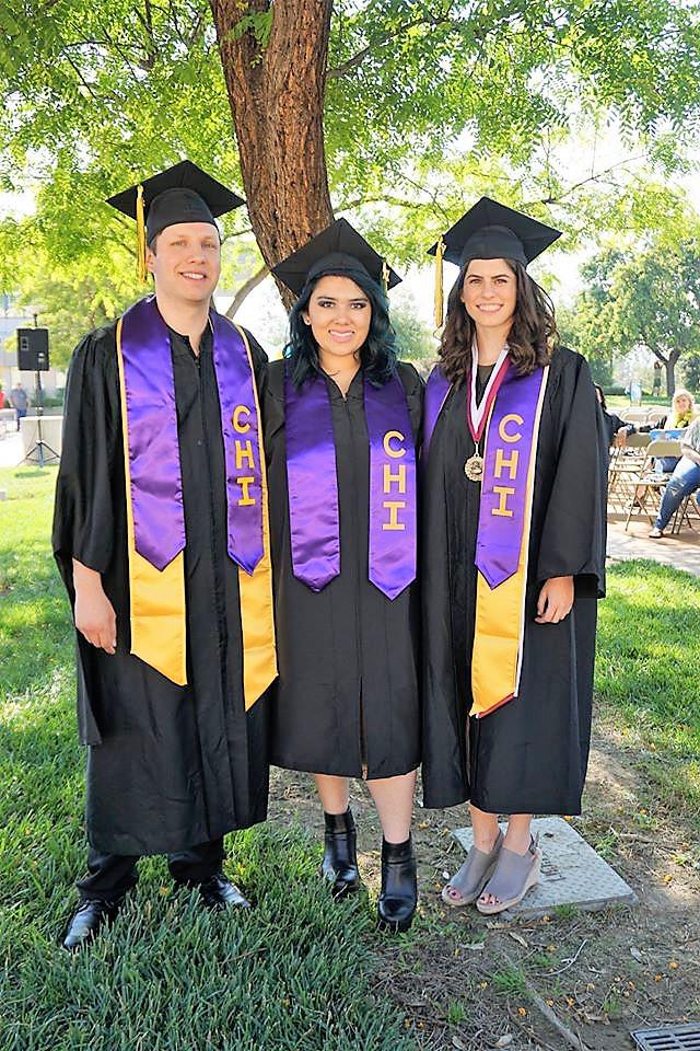  Three students in the College Honors Institute program.