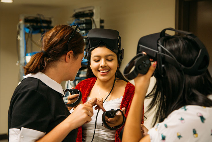 Students and professor with virtual reality gear