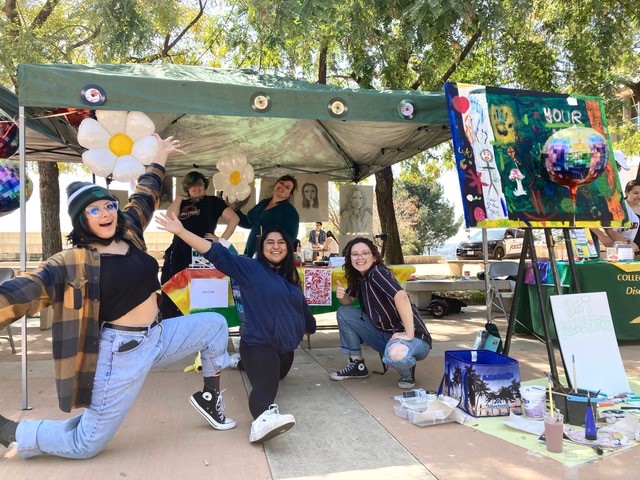 Art Collective members at booth