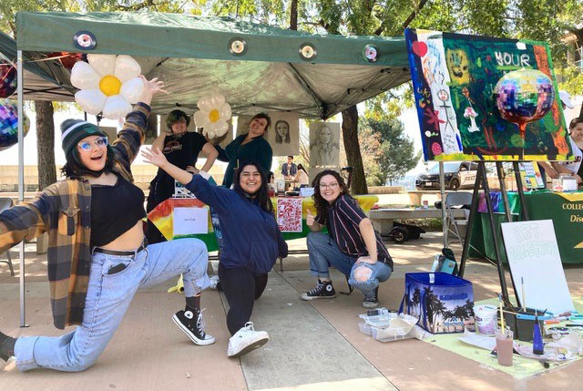 Art Collective members at booth