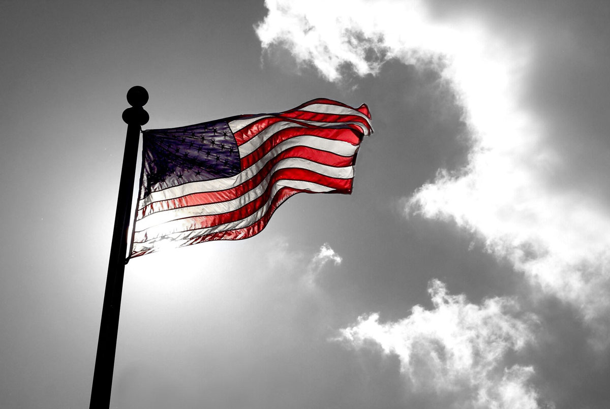 Flag in front of clouds