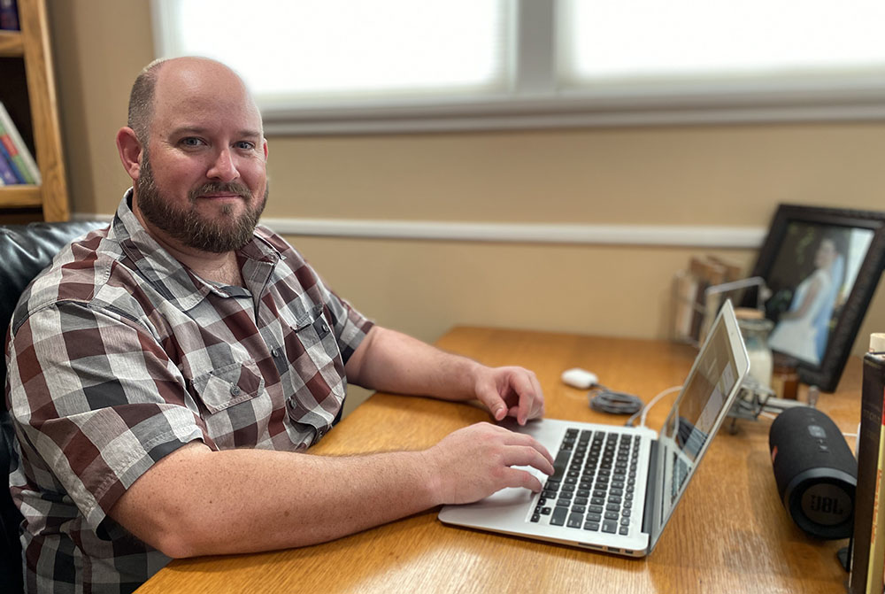 Staff Member on computer
