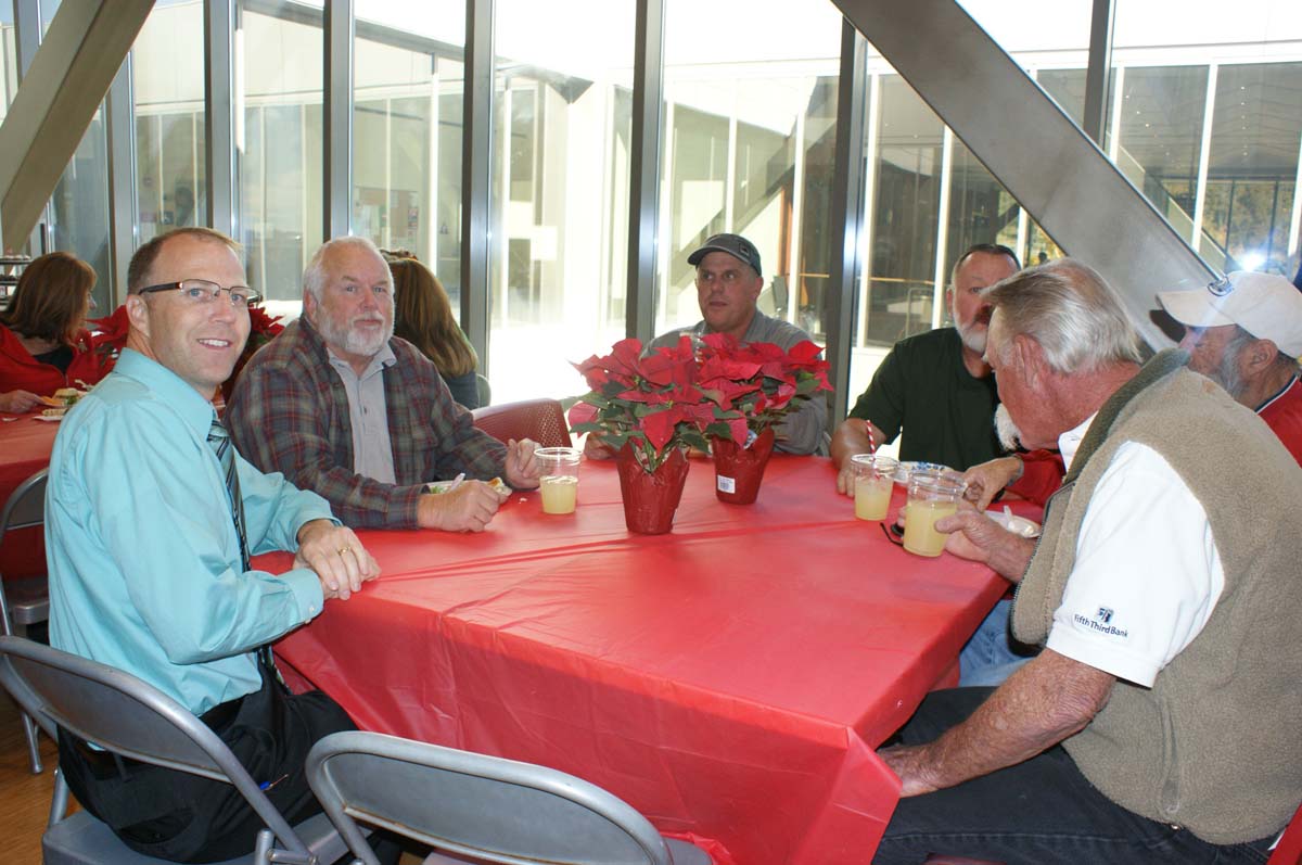 People enjoying the holiday party