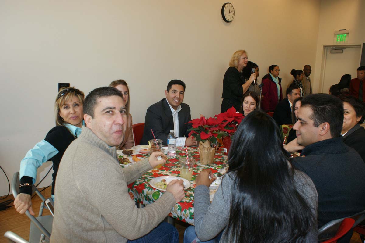 People enjoying the holiday party