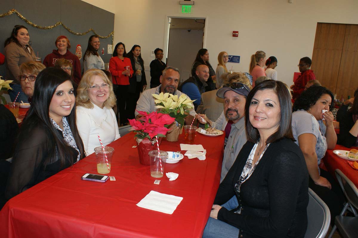 People enjoying the holiday party