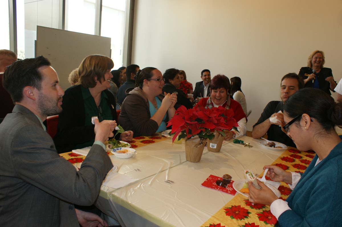 People enjoying the holiday party