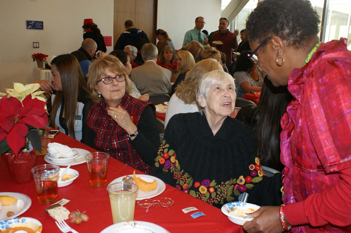 People enjoying the holiday party