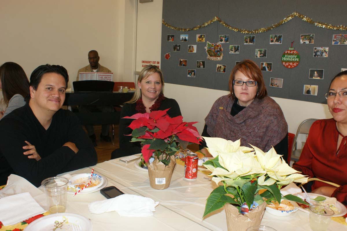 People enjoying the holiday party