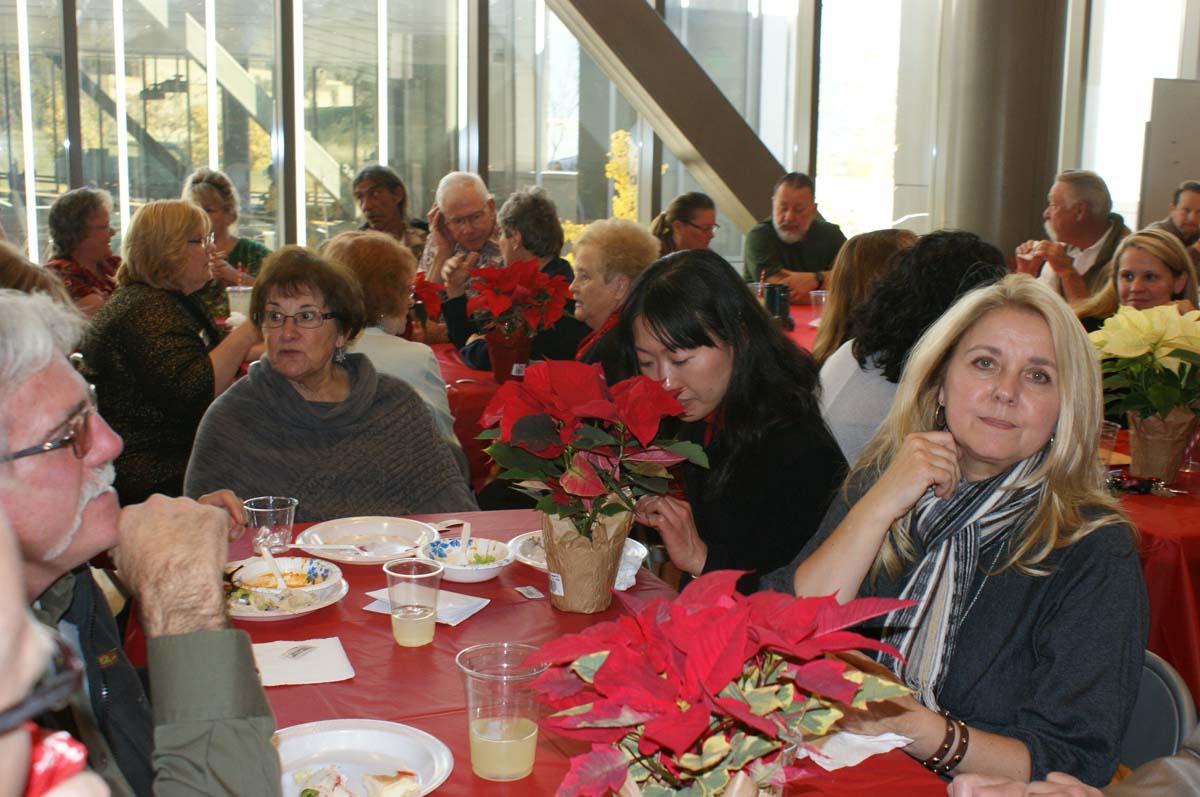 People enjoying the holiday party
