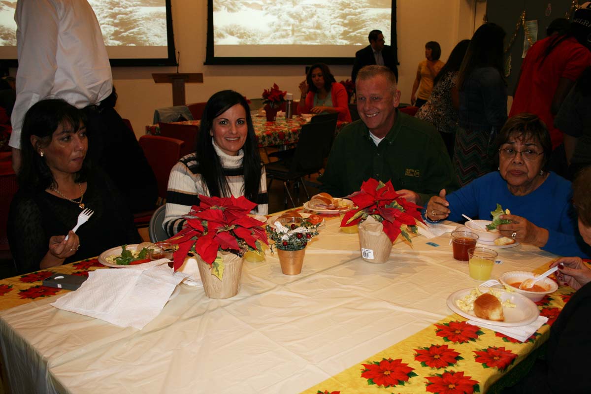 People enjoying the Holiday Party