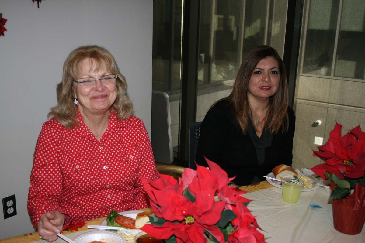 People enjoying the Holiday Party