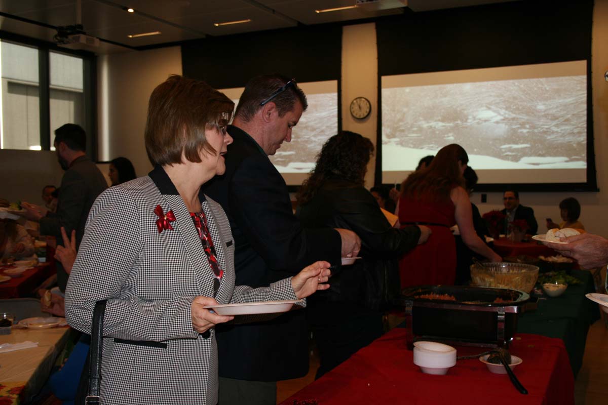 People enjoying the Holiday Party