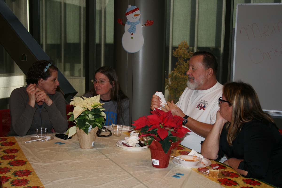 People enjoying the Holiday Party