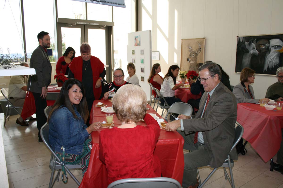 People enjoying the Holiday Party