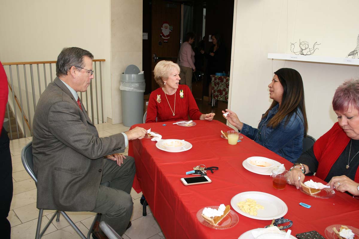 People enjoying the Holiday Party