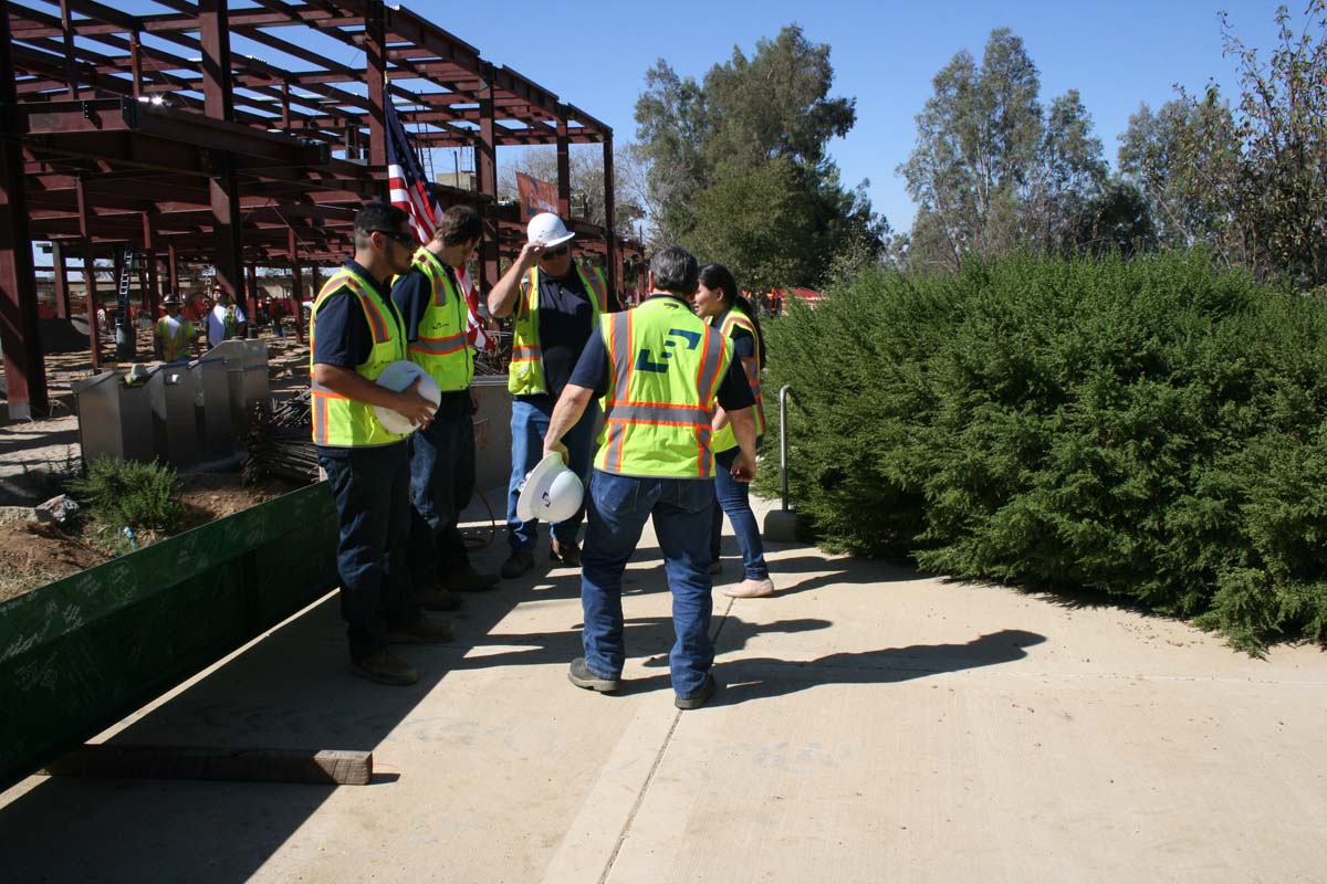 People enjoying the Topping Out event