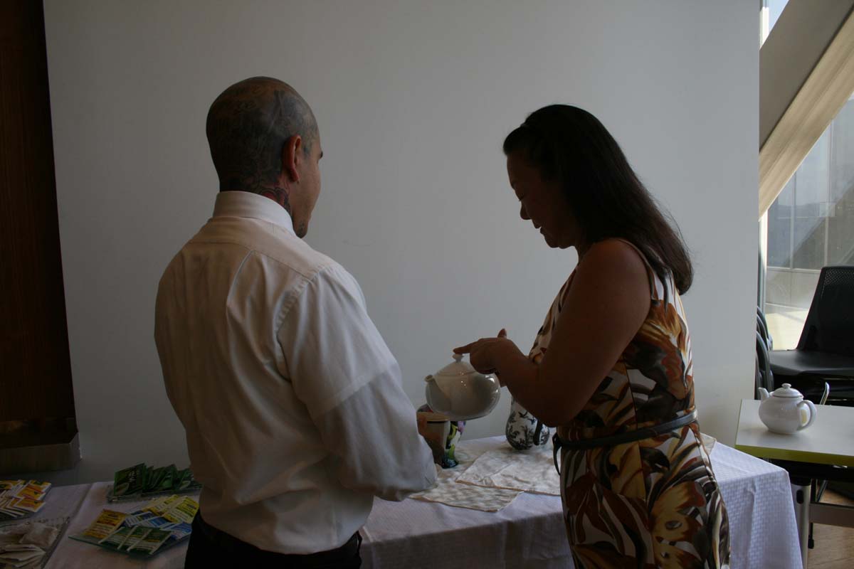 People enjoying Tea with the Deans
