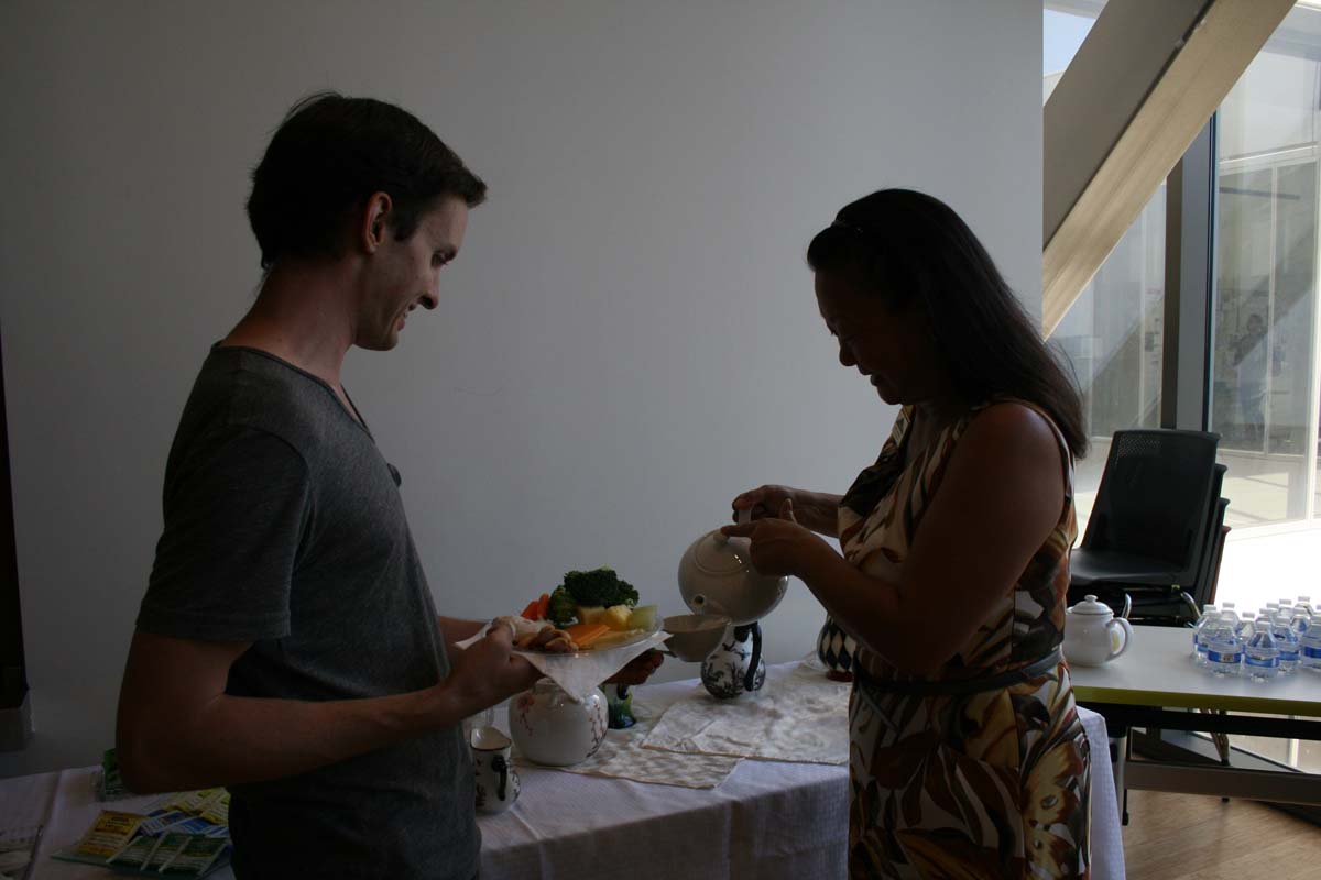 People enjoying Tea with the Deans