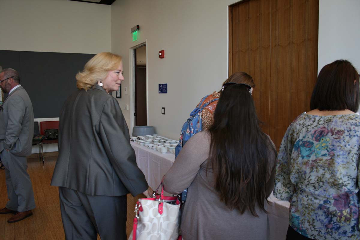 People enjoying Tea with the Deans