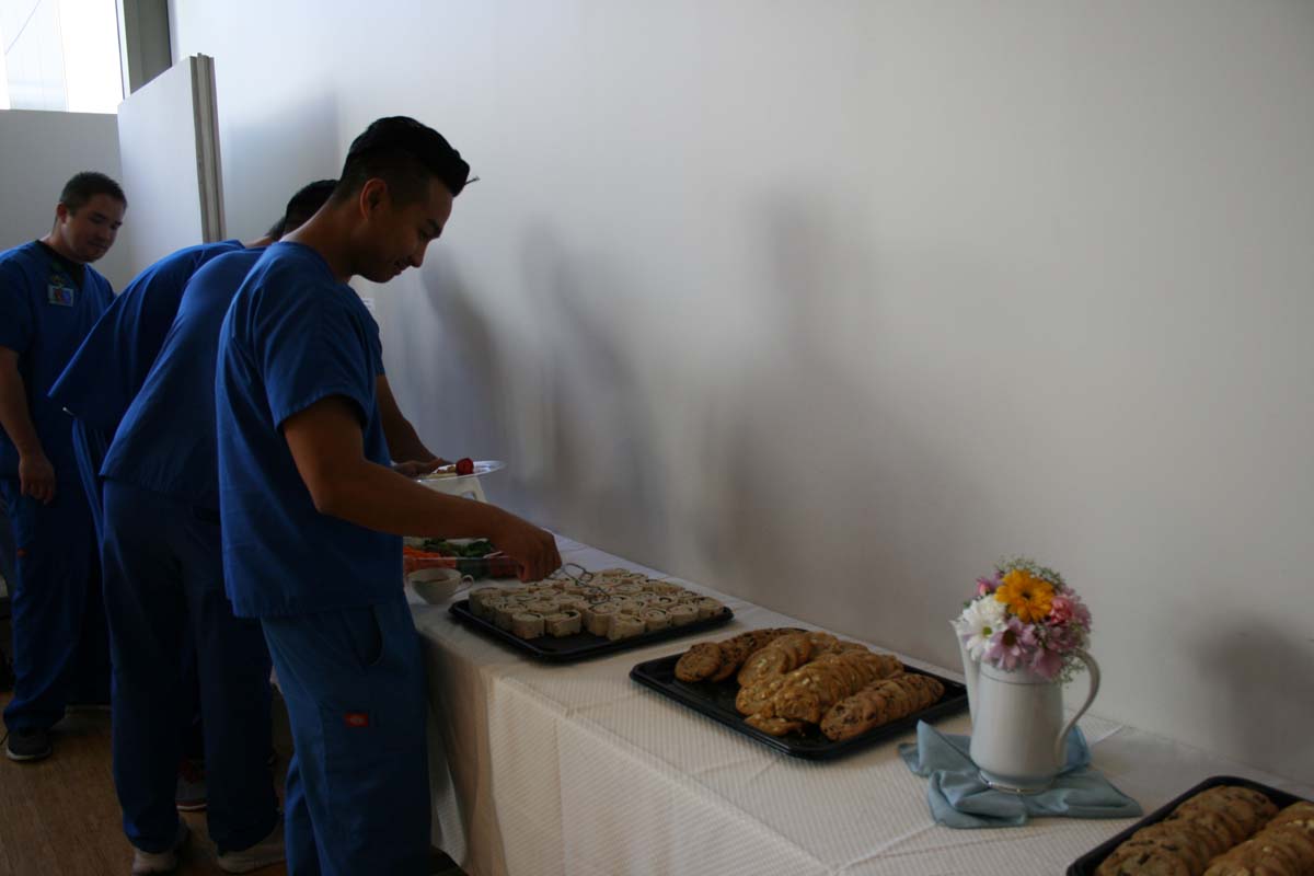 People enjoying Tea with the Deans