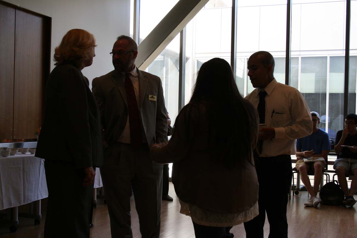 People enjoying Tea with the Deans