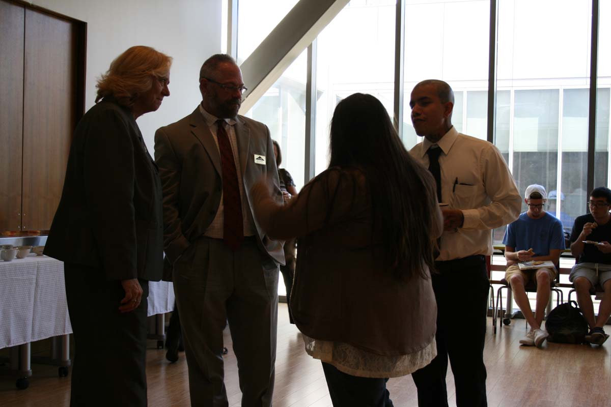 People enjoying Tea with the Deans