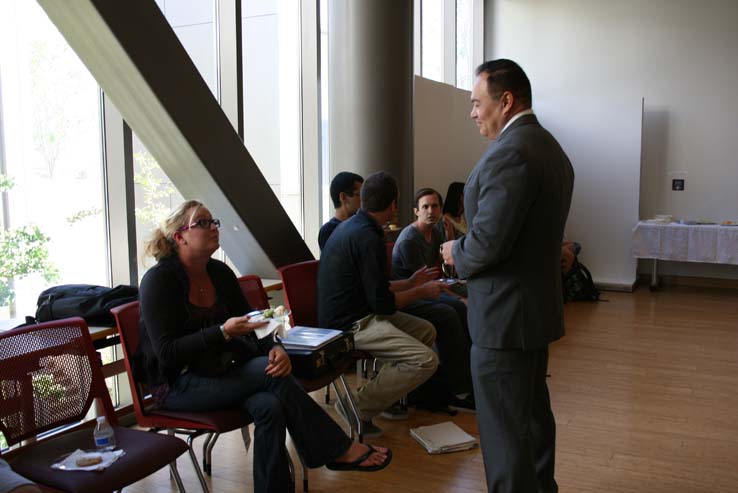 People enjoying Tea with the Deans