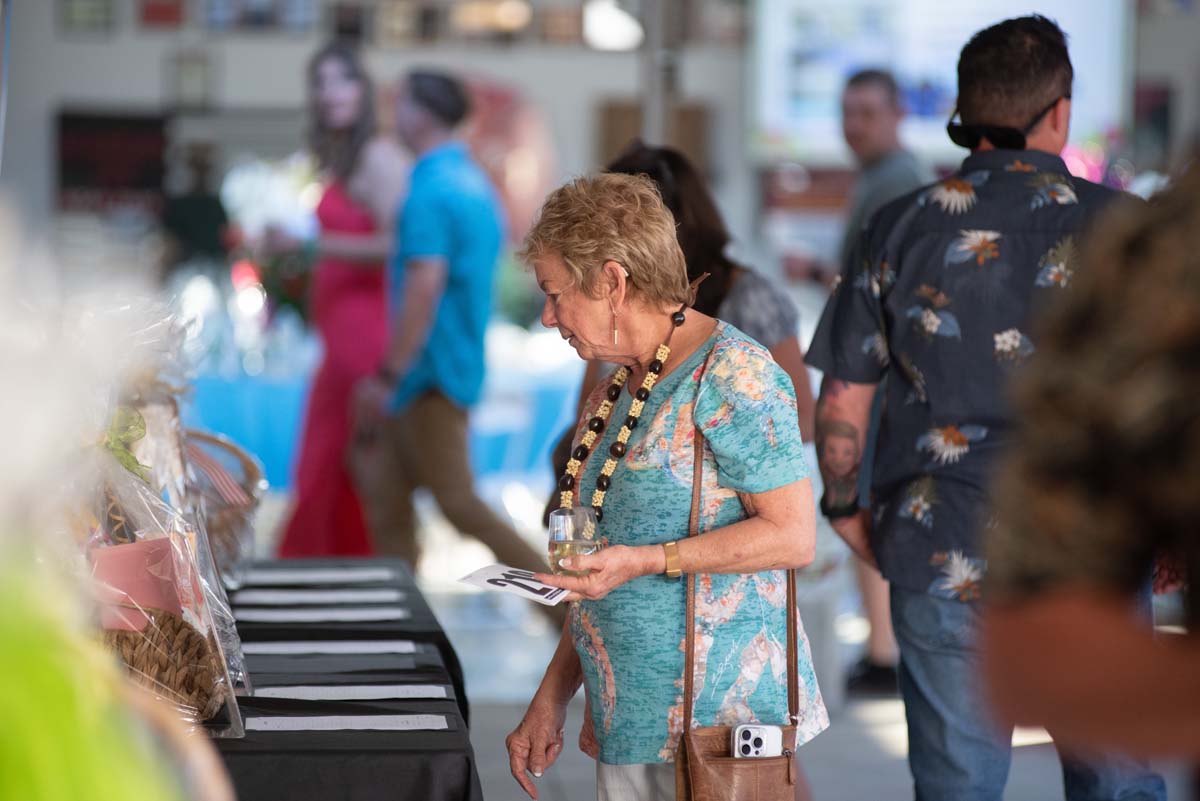 Woman at auction table