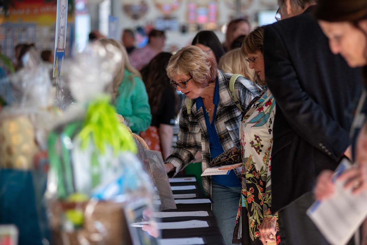 Woman at auction table