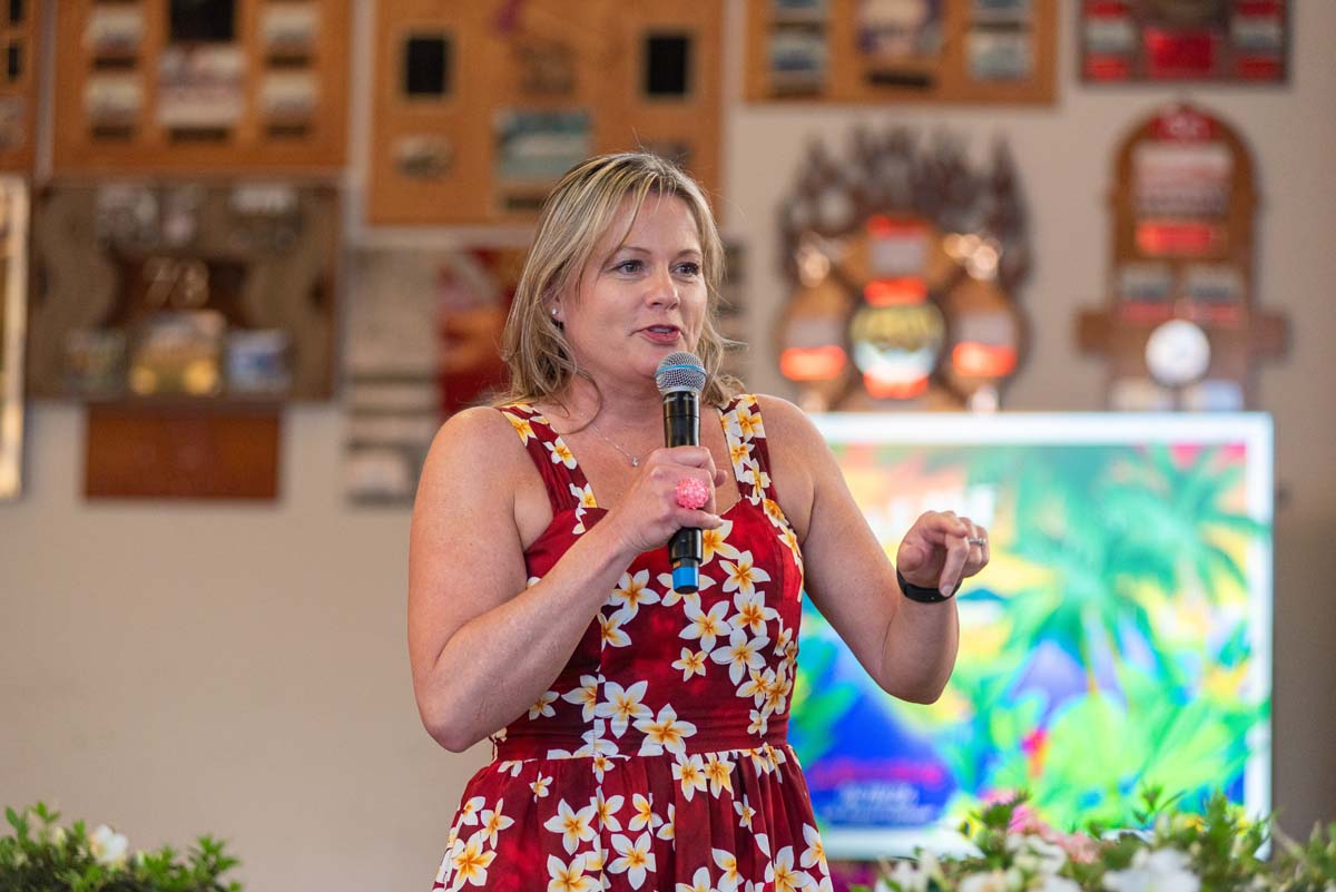 Michelle Riggs with microphone