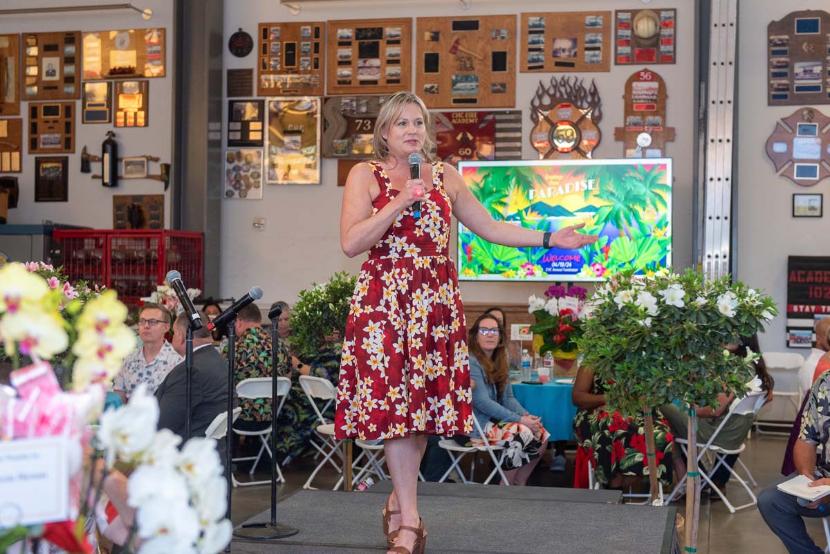 Michelle Riggs with microphone