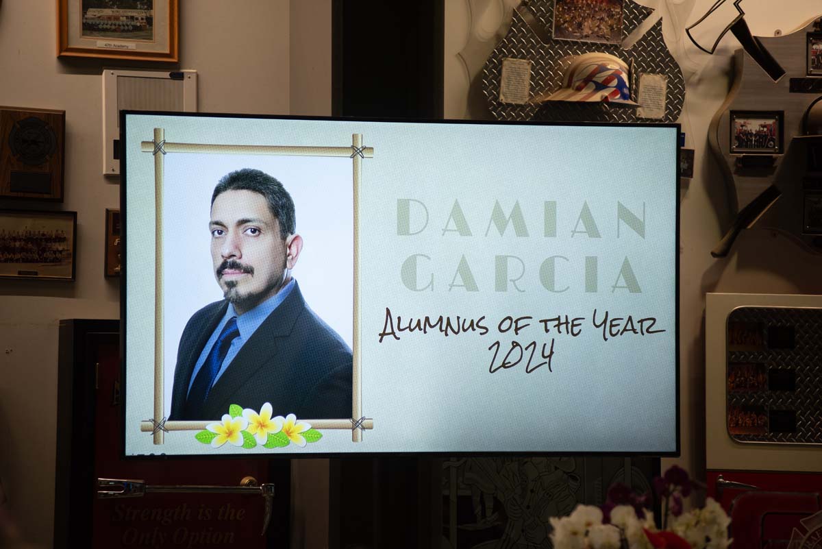 Sign with Damian Garcia: Alumnus of the Year 2024
