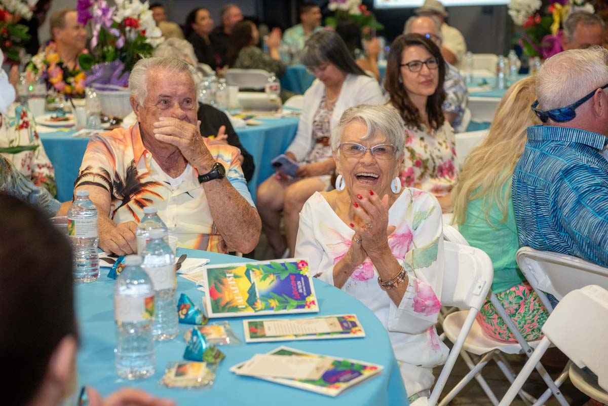 Happy people at tables