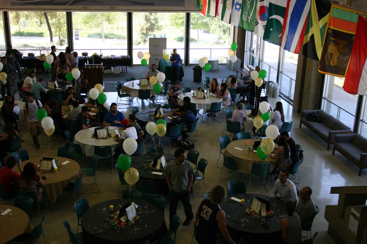 People enjoying the Transfer Luncheon