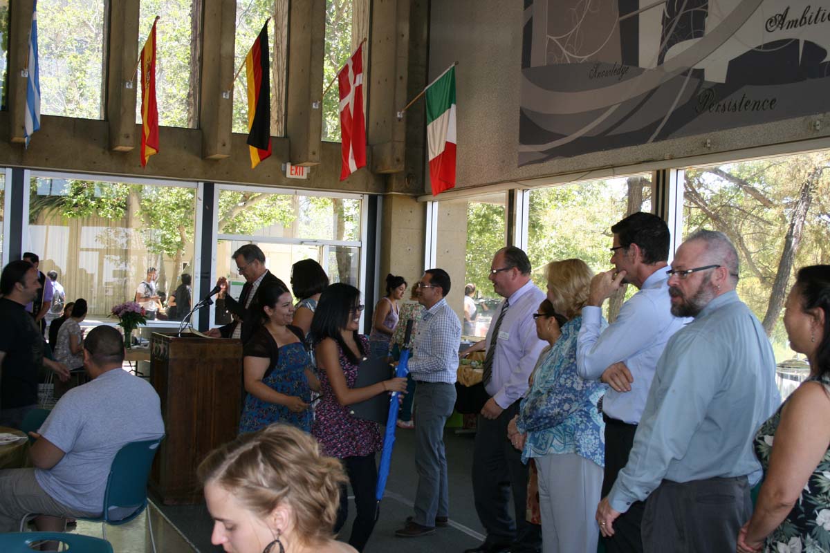 People enjoying the Transfer Luncheon