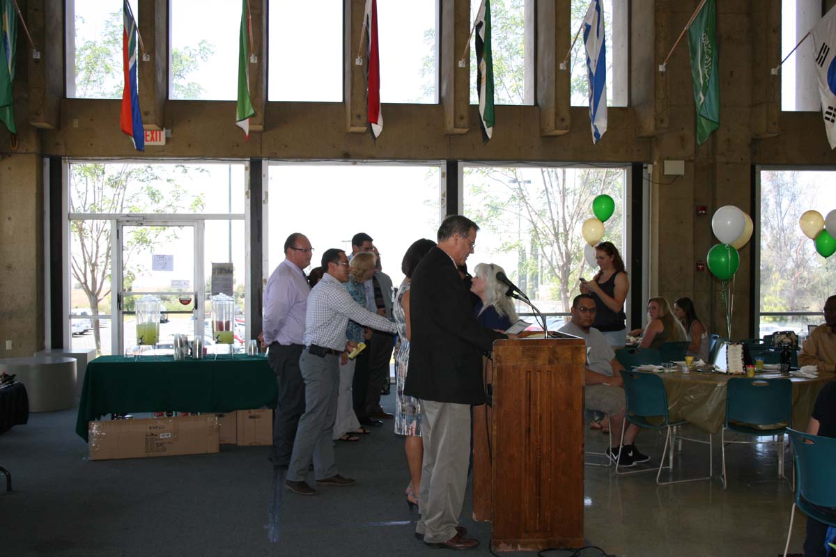 People enjoying the Transfer Luncheon