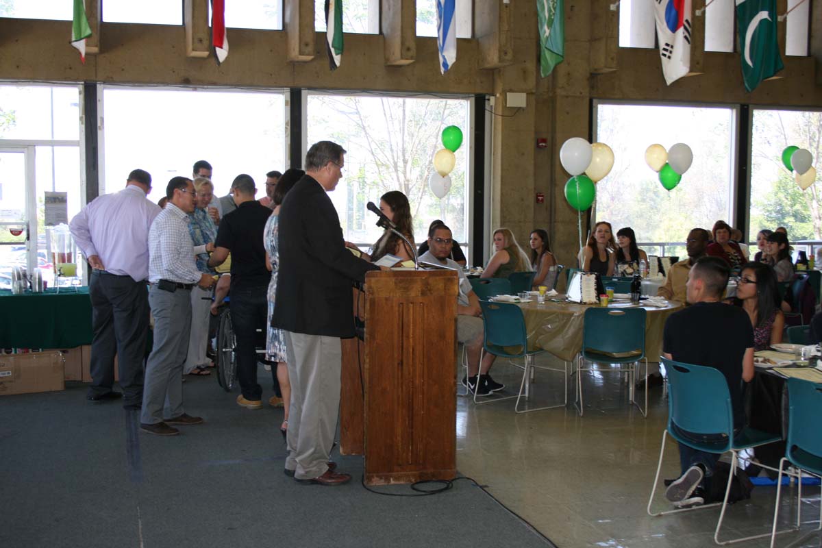 People enjoying the Transfer Luncheon