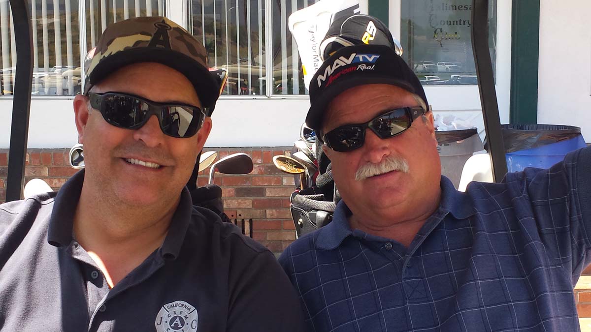 People enjoying the Fire Academy Golf Tournament