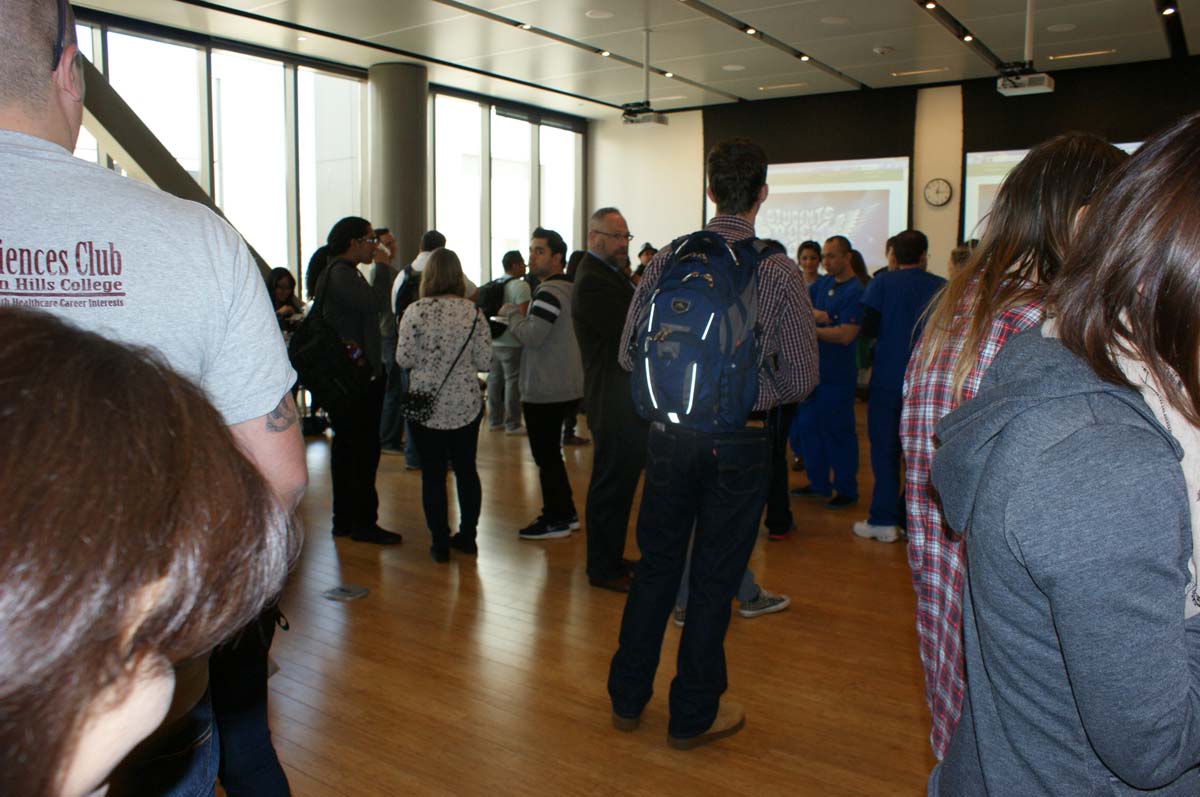 People enjoying Tea With the Deans