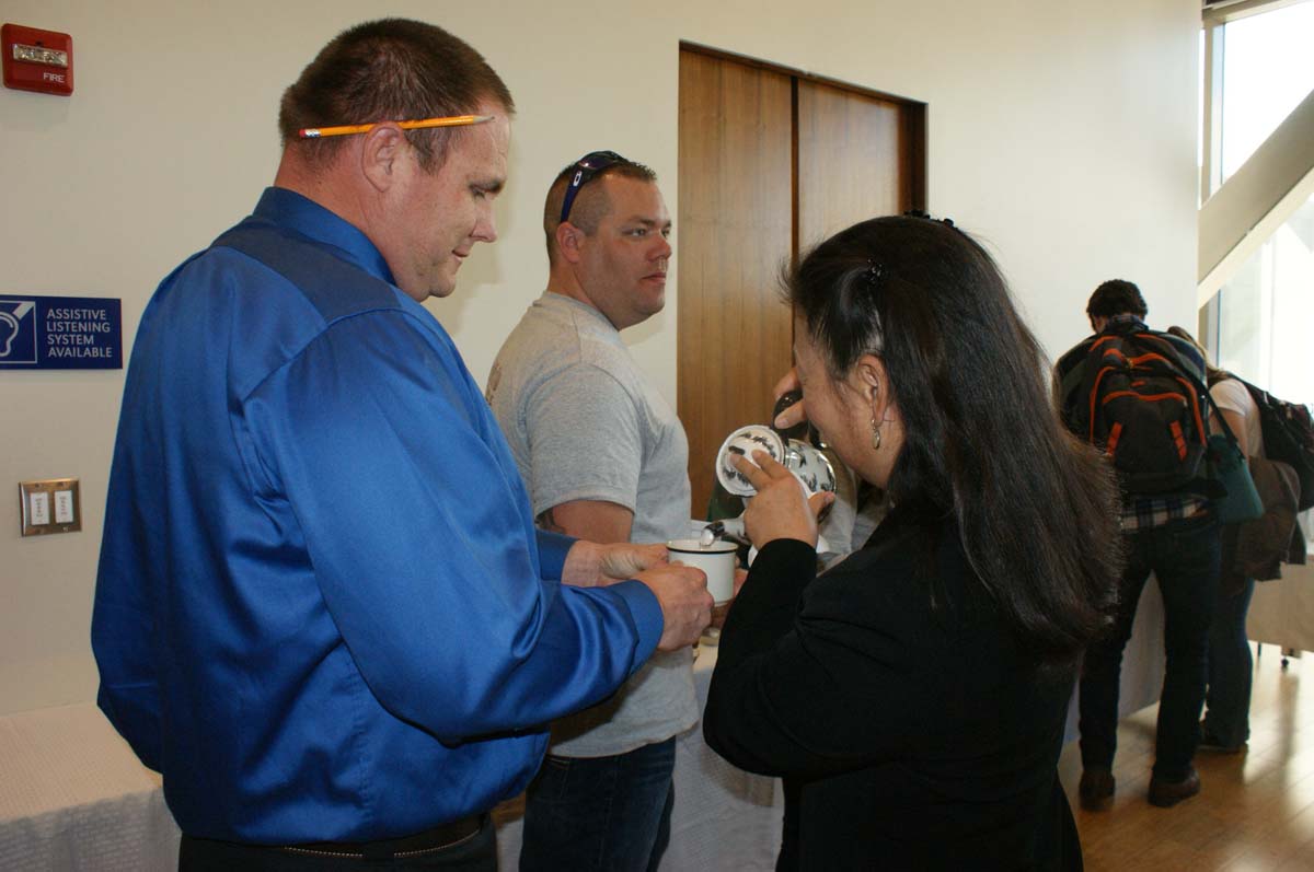 People enjoying Tea With the Deans