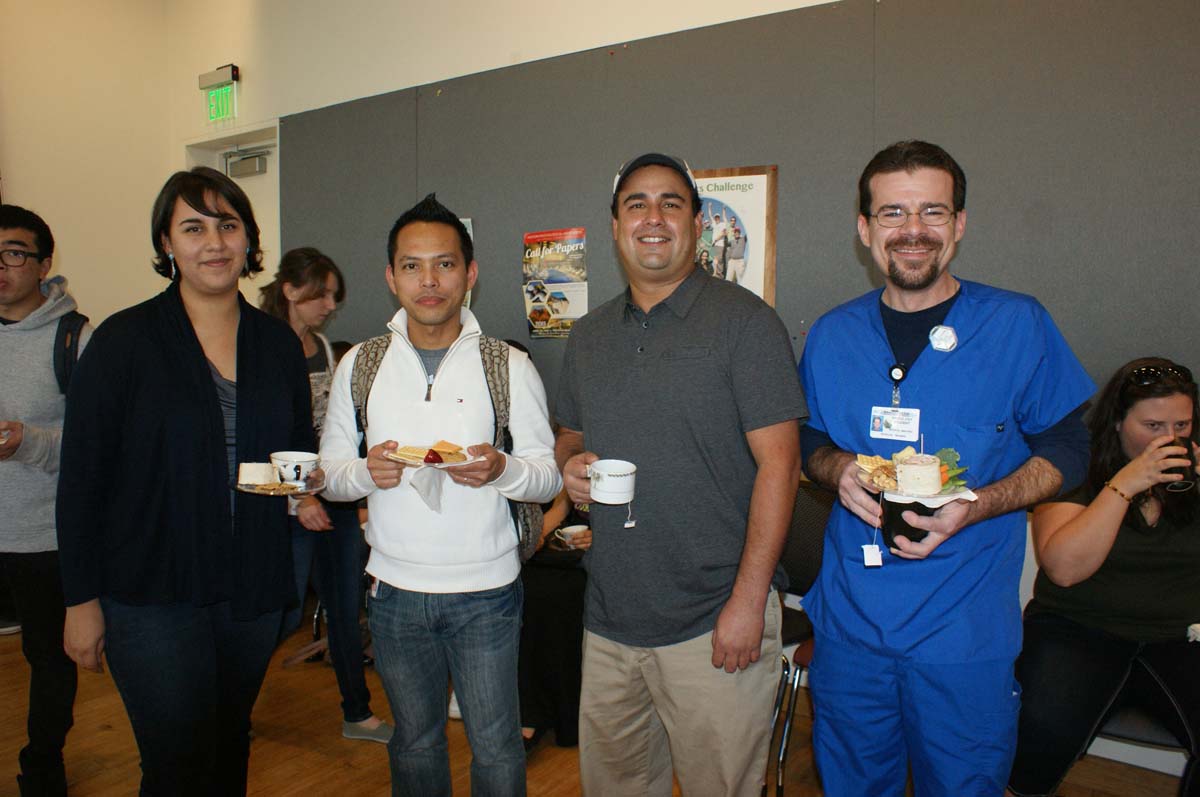 People enjoying Tea With the Deans