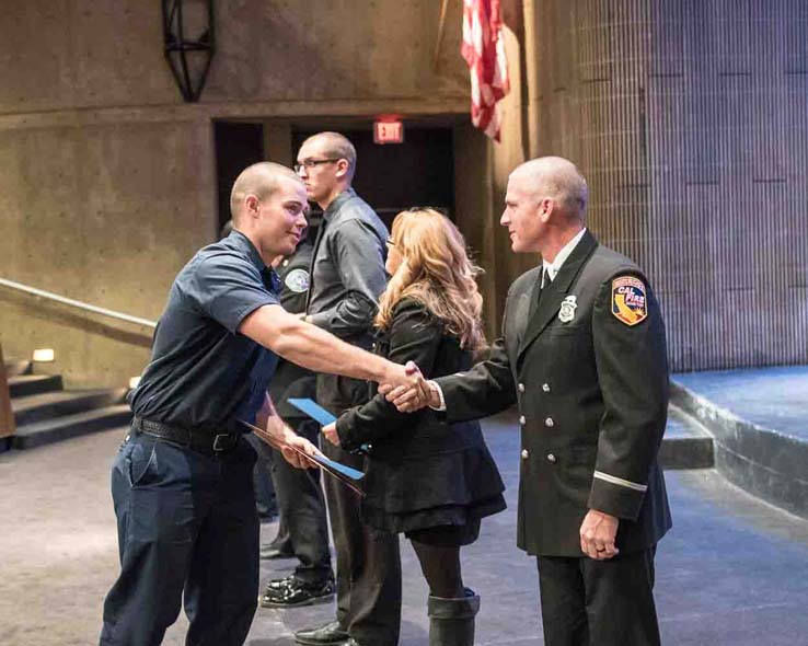 Students at Fire Academy graduation