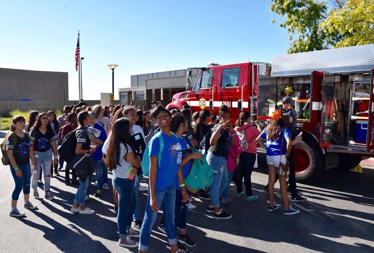 Ambulance and people at Allied Health and Medical Careers day