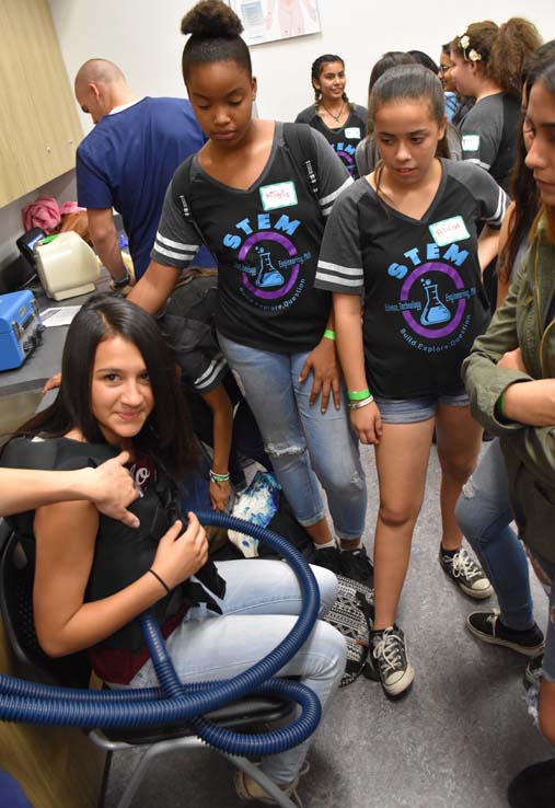 Ambulance and people at Allied Health and Medical Careers day