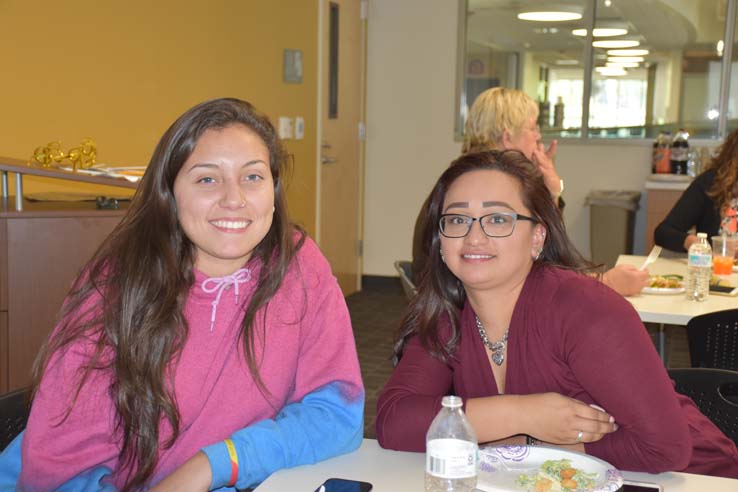 People enjoying the holiday party