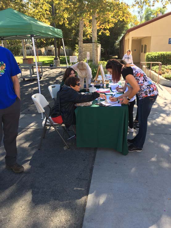 People enjoying the Three Peaks Challenge food sorting event